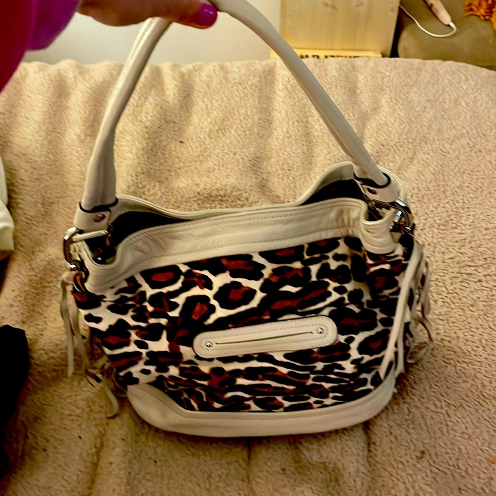 B. Makowsky animal print tote with tassels and inner pocket